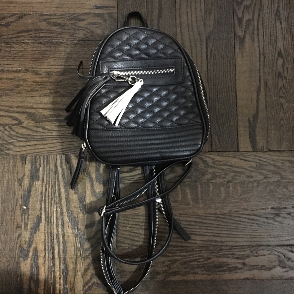 Black leather mini knapsack backpack with tassels